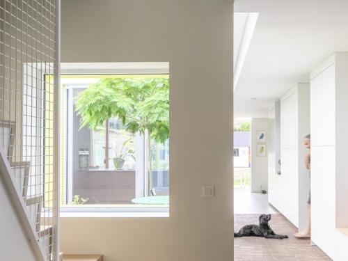 Via een open trap in de eetkamer ga je naar de bovenverdieping.