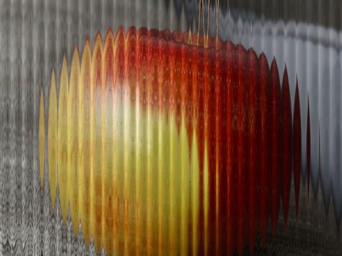 Une pomme, vue à travers le filtre Lenticular.