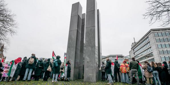 Palestinians and their supporters by the Holocaust Memorial take part during International Court of Justice (ICJ hearing).