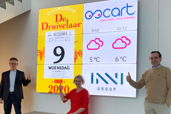 Tom Deschildre (Inni), Christine Desmet (redactie De Druivelaar) en Jochen Verbrugghe (Oscart) zijn trots met de nieuwe, hedendaagse toepassing van de ‘oeroude’ Druivelaar.