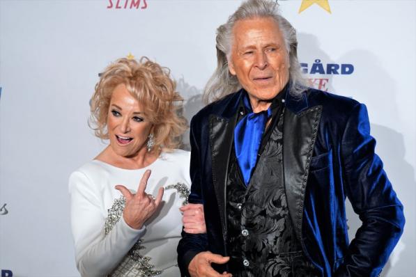 Peter Nygard photographié en compagnie de Tanya Tucker 3 ans avant son arrestation - Getty Images