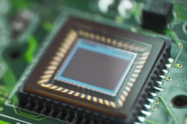 Aandeel Besi | Chipmachinemaker rekent