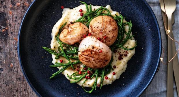 Een kerstmenu met schaal- en schelpdieren