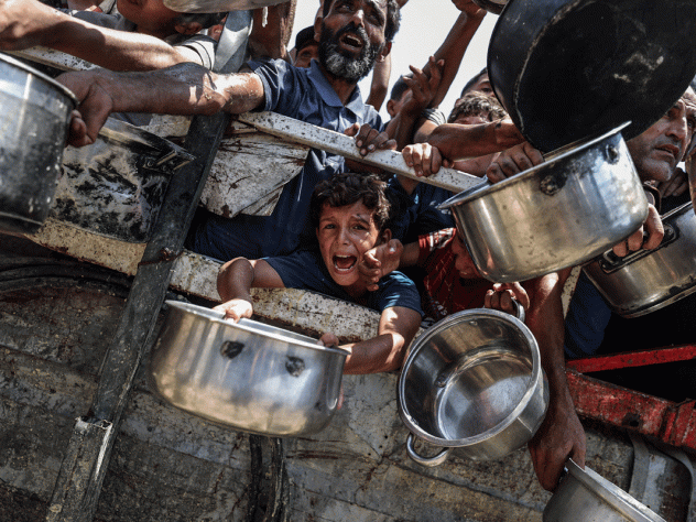 Voedselbedeling in Gaza-stad op maandag.