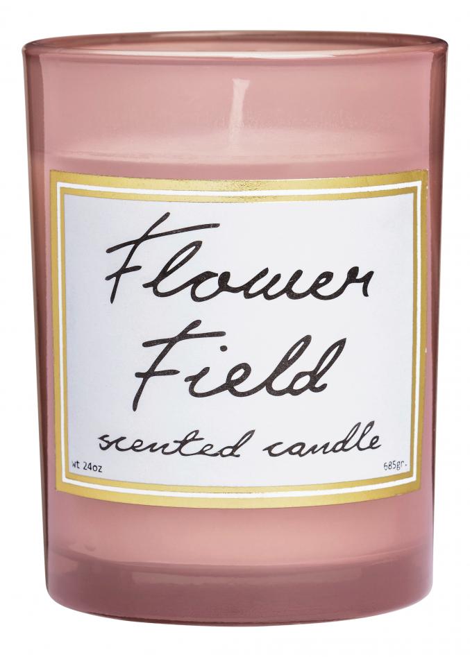 Grande bougie parfumée dans un verre rosé «Flower Field», 14,99 €, H&M Home.