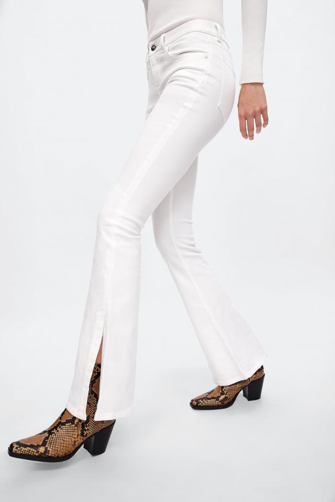 Witte flared jeans met split