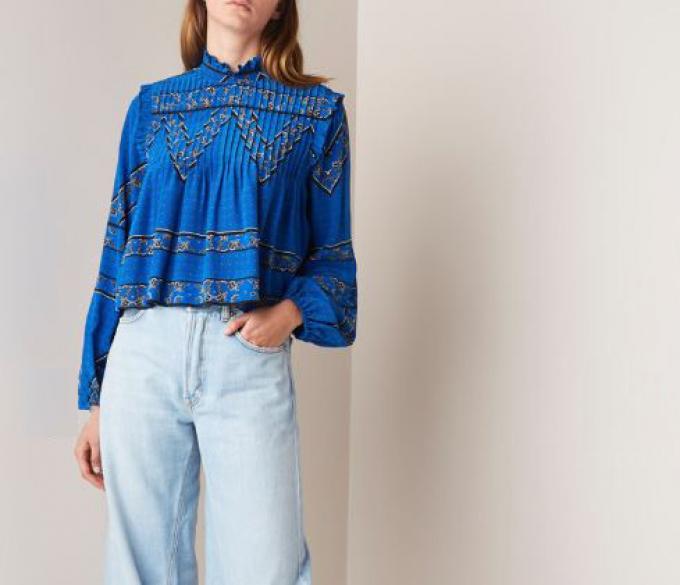 Blauwe blouse met western-patroon