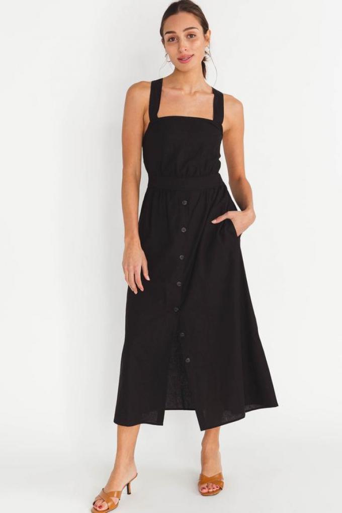 Simpele zwarte parisienne-jurk met knoopjes