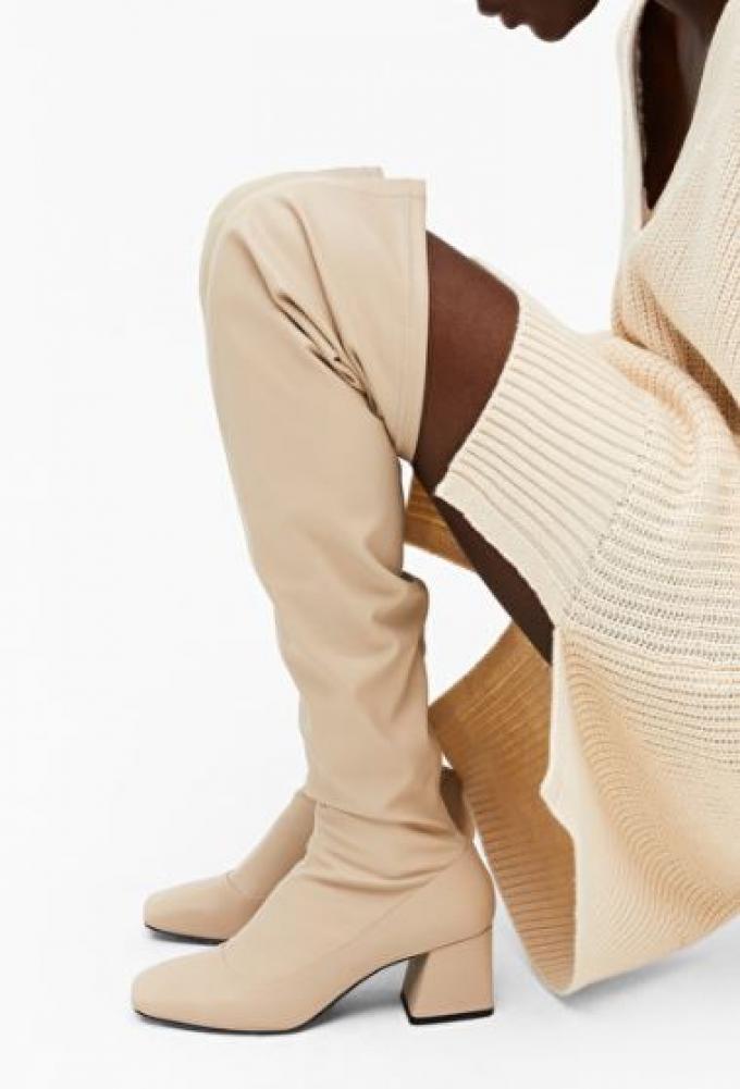 Over-the-knee boots in écru faux-leer