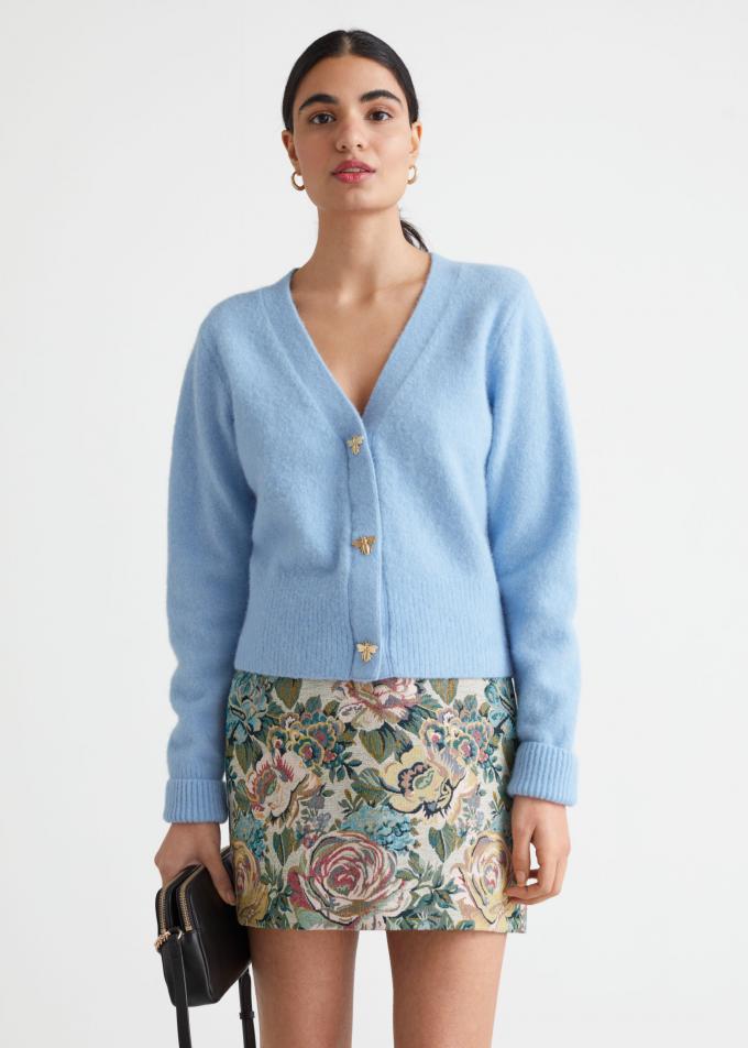Babyblauwe wollen cardigan