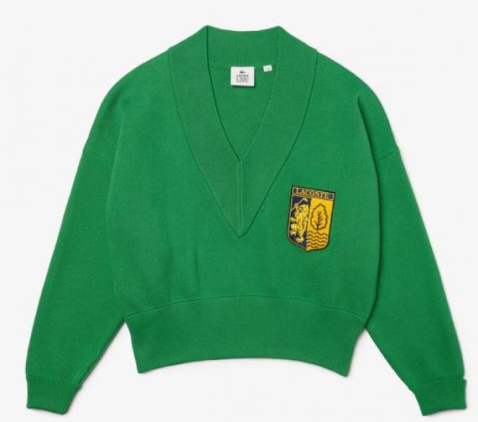 Groen knitted sweatshirt met badge en V-hals