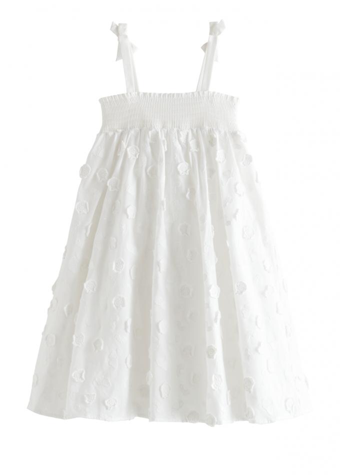 Mini: witte midi-jurk met smockwerk