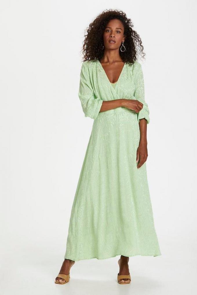 Limoengroene maxi-jurk in jacquard met lange mouwen
