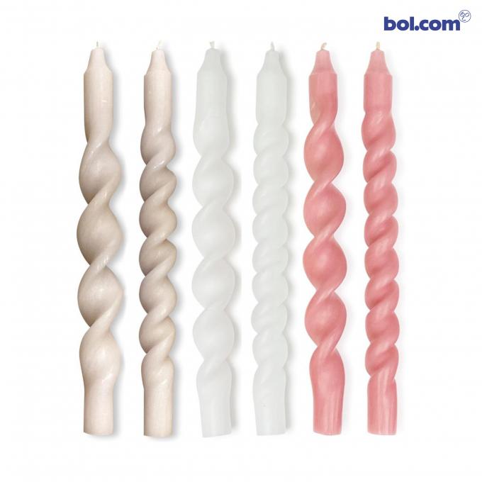 Roze en witte gedraaide kaarsen
