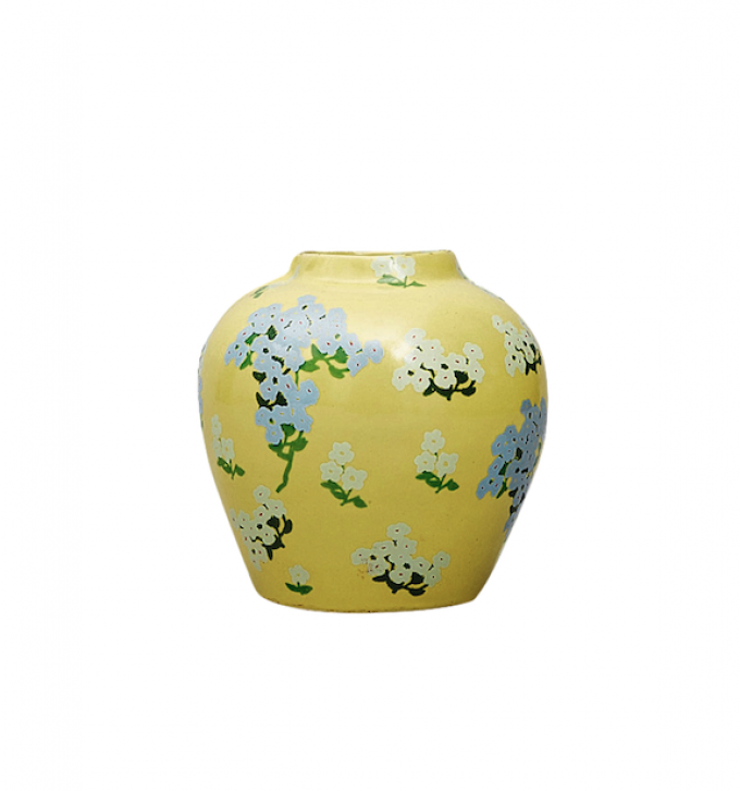 Le vase fleuri en céramique