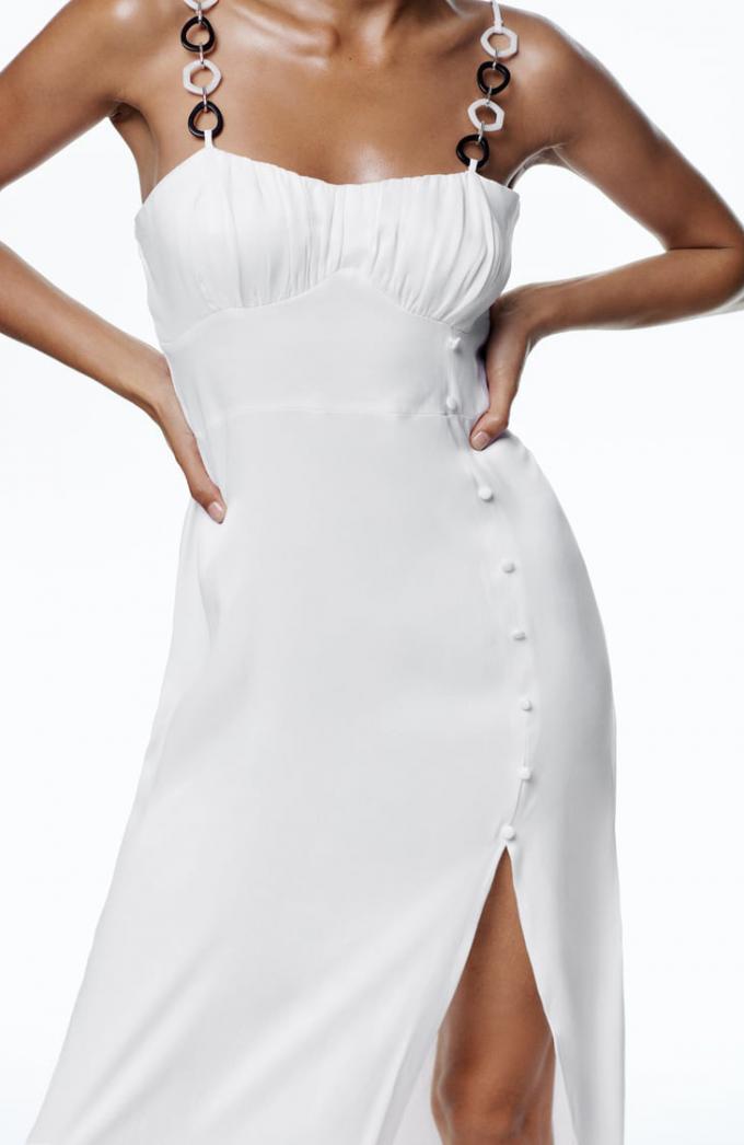Witte jurk in korsetmodel 