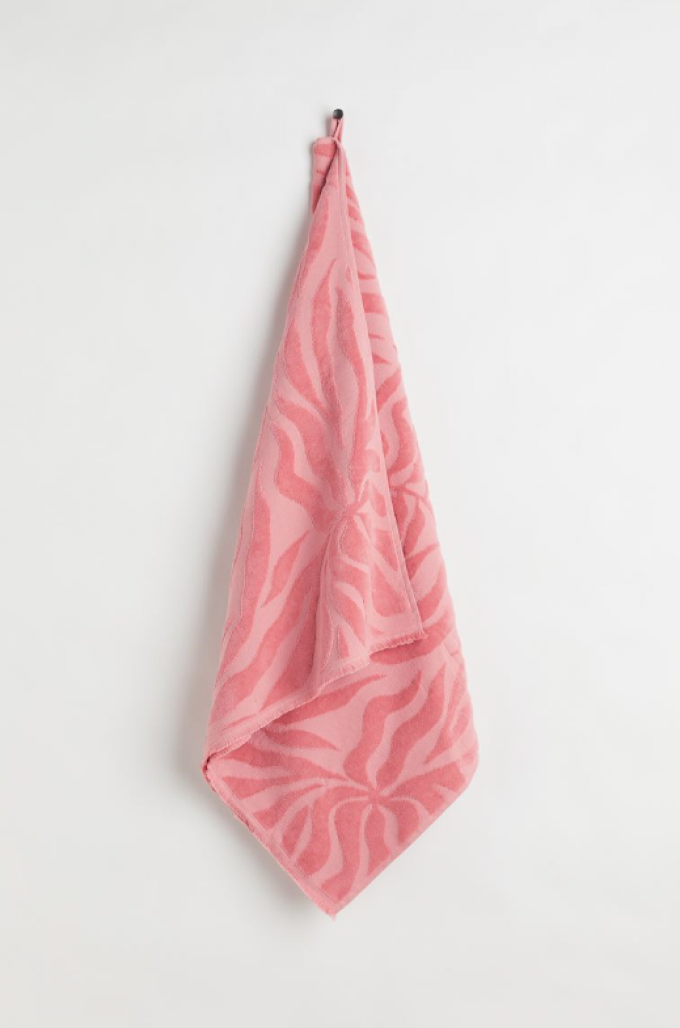 Jacquardgeweven badhanddoek in koraalroze