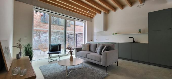 De strook naast de kerk werd ook aangekocht voor extra woonruimte en een privétuintje