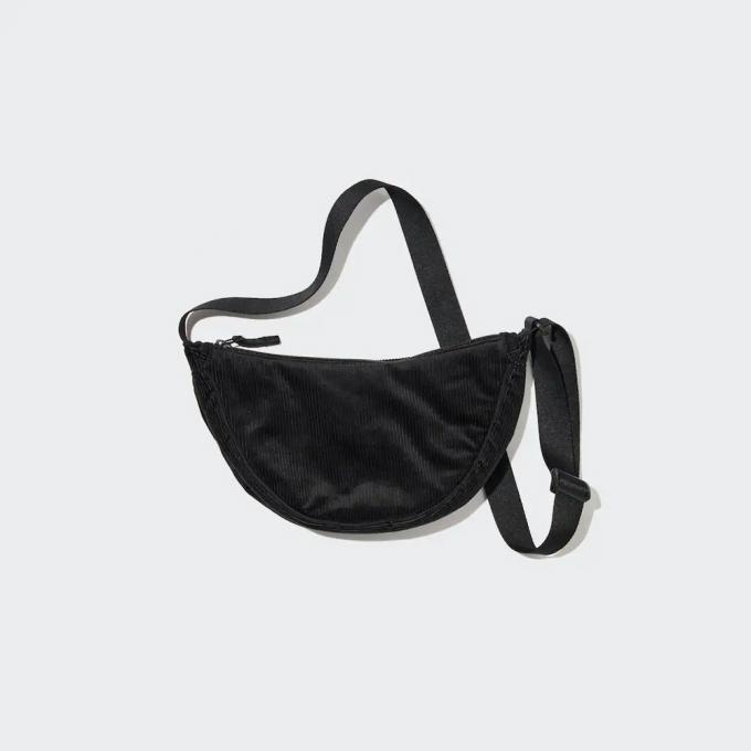 Ribfluwele tas in zwart