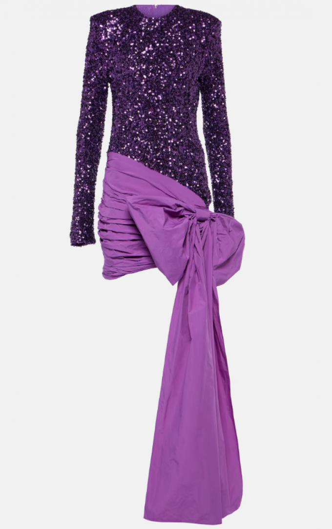 Feestelijke paarse jurk met glitters en statement strik 