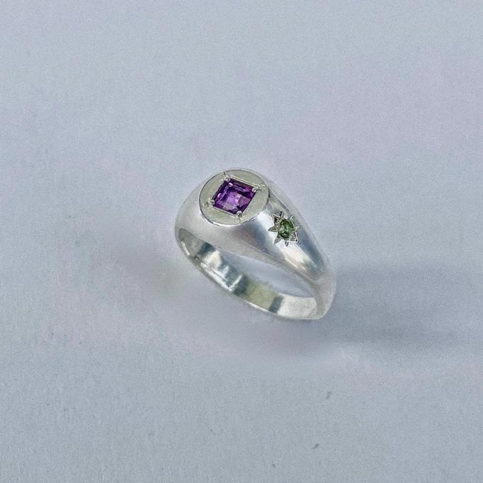 Zilveren ring met peridoot en paarse amethyst 