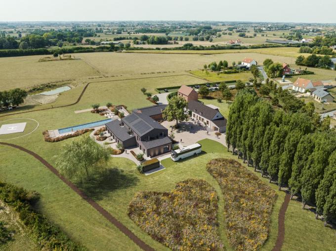 Een luchtbeeld van het resort, te midden van het groen in het landelijk gedeelte van Sint-Eloois-Winkel.