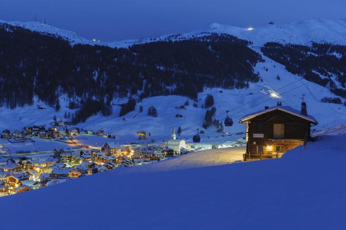 Livigno voelt authentiek en kleinschalig aan, met tal van fotogenieke houten huisjes. (foto inLombardia)