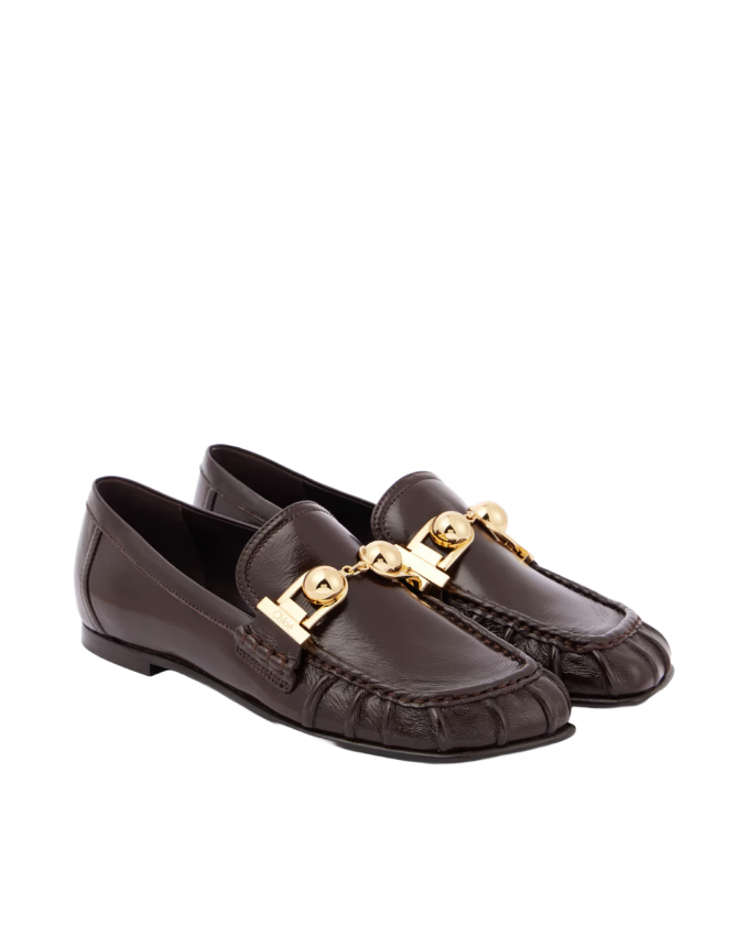 Loafers met gouden accent 