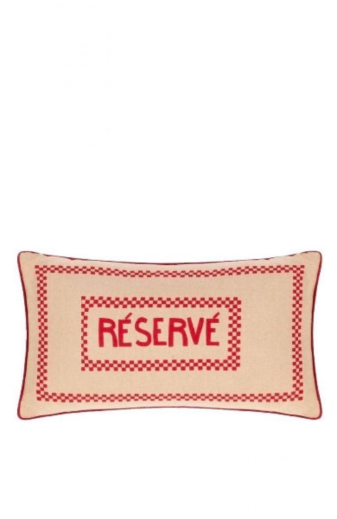 Beige katoenen kussen met rood opschrift ‘Reservé’ (50 x 30 cm)