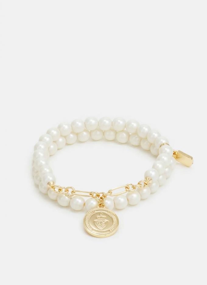 Bracelet de perles et breloque dorée