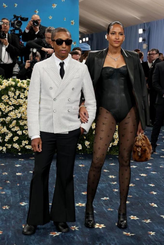 Pharrell Williams en Helen Lasichanh