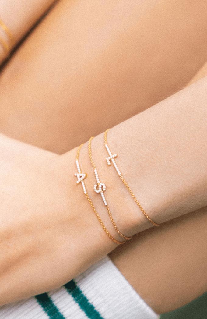 Tennisarmband met letter uit verguld zilver 