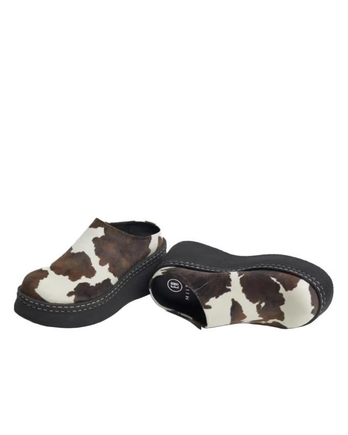 Klompjes met vlekken