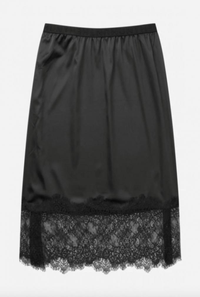 Jupe en soie noire avec bordure en dentelle