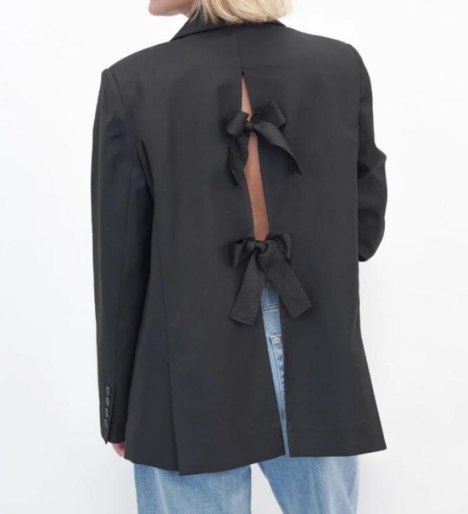 Zwarte blazer met strikdetail op de rug