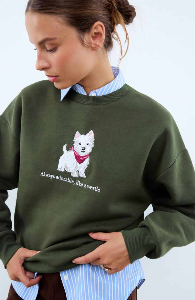 Groene sweater met quote