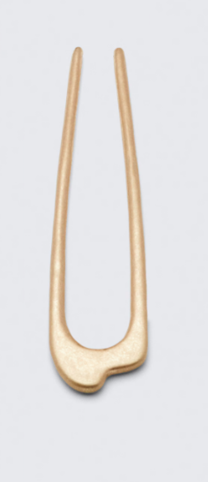 La barrette sculpturale en métal 