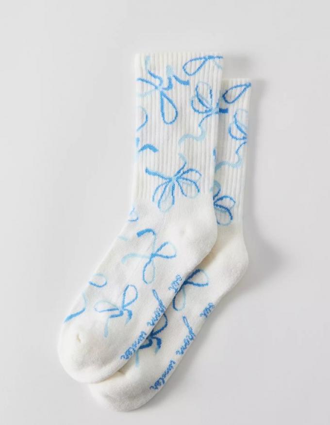 Witte kousen met lichtblauwe strikjes 