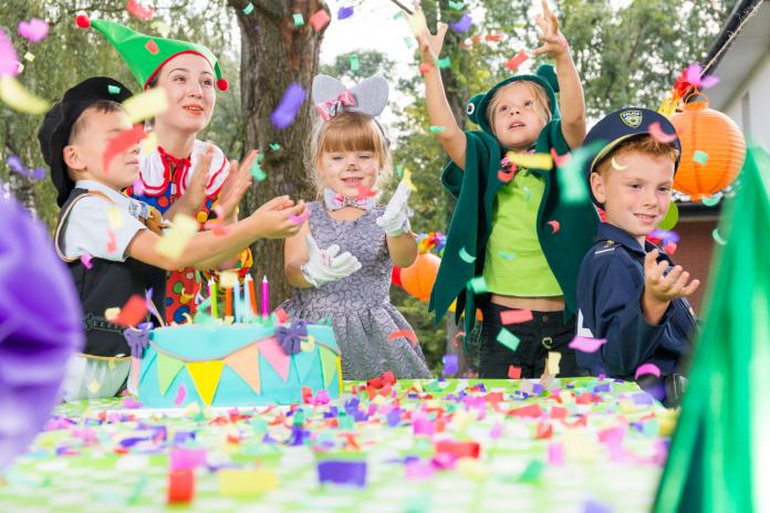 Children playing during birthday party
