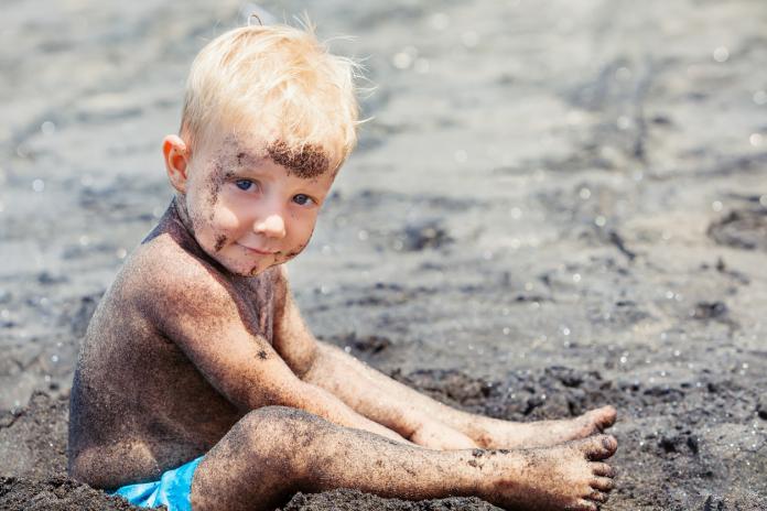 Happy family. Mother, little child on summer beach vacation