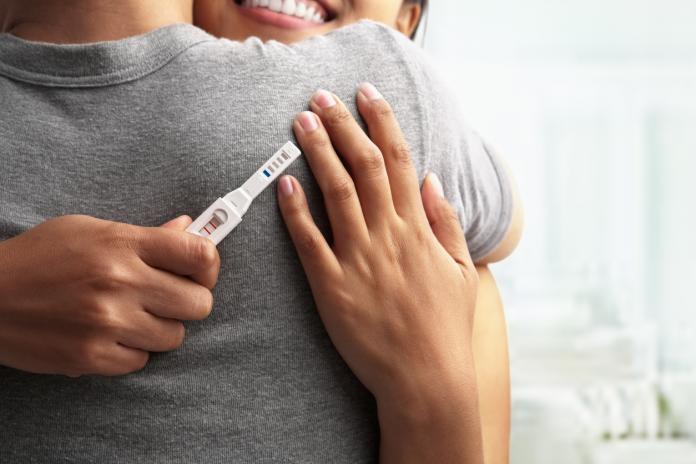 Joyful with positive pregnancy