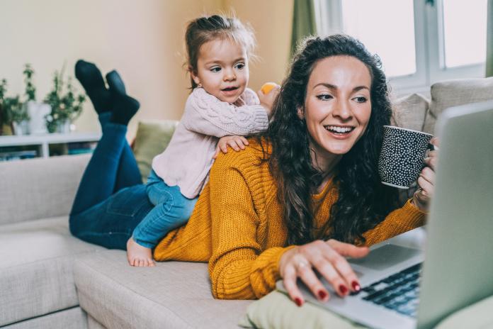 Mother and daughter Having fun online