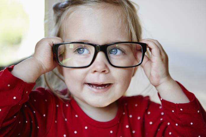Young girl wearing glasses