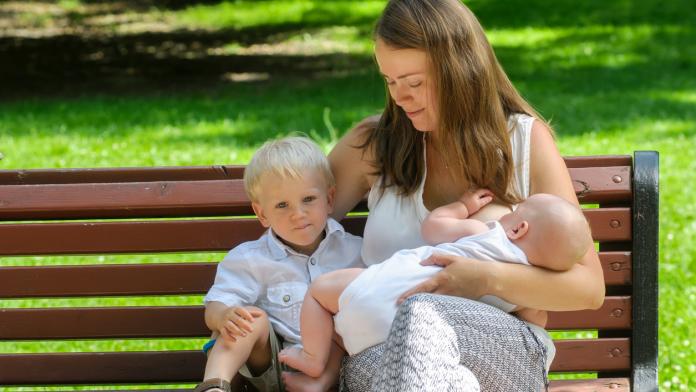 mother with newborn baby and son