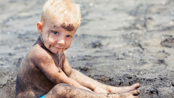 Happy family. Mother, little child on summer beach vacation
