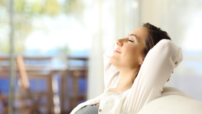 Woman relaxing on vacations in an apartment