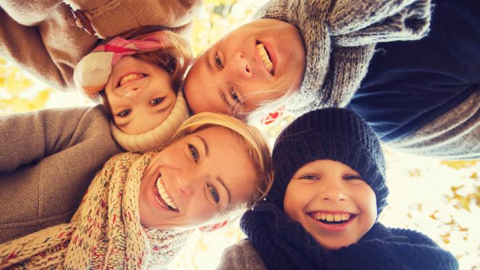 happy family in autumn park