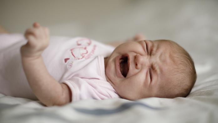 Newborn baby girl crying huilbaby