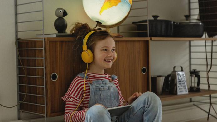 Girl using digital tablet