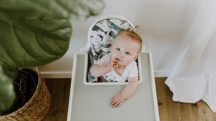 Baby sitting in highchair IKEA kinderstoel pimpen